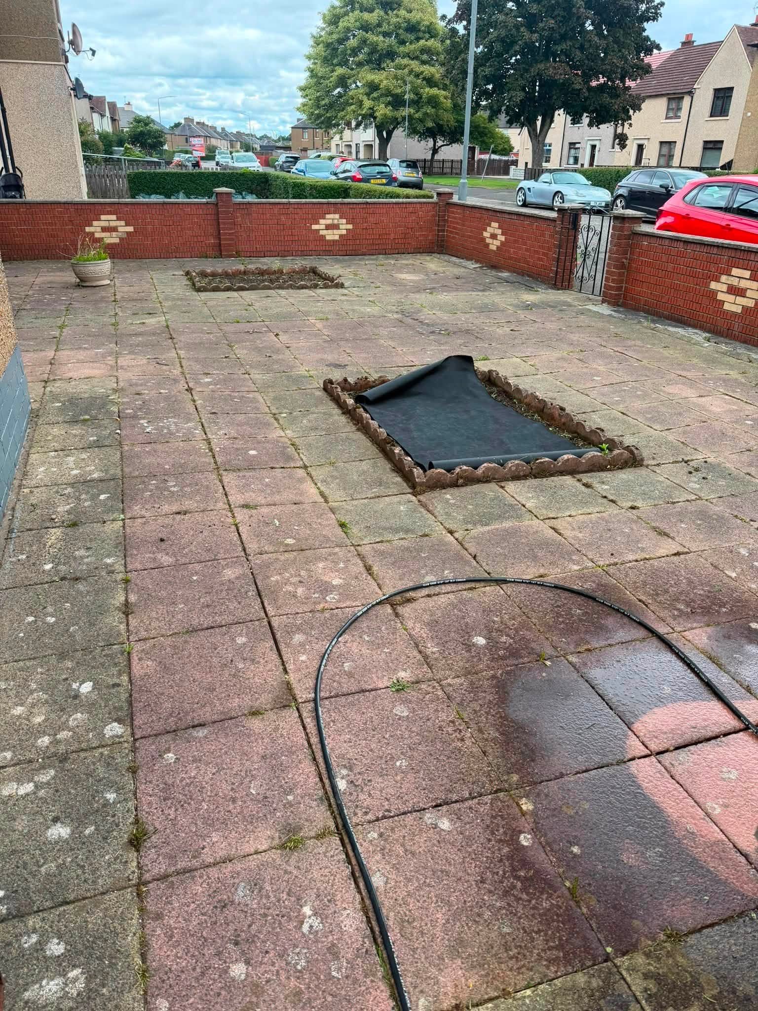 Finished landscaped garden with fencing and raised beds
